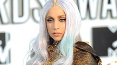 Lady Gaga arrives on the red carpet for the 2010 MTV Video Music Awards at the Nokia Theater in Los Angeles on Sepetember 12, 2010. AFP PHOTO / ROBYN BECK