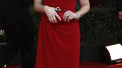 Edie Falco arrives for the Golden Globe Awards Sunday, Jan. 16, 2011, in Beverly Hills, Calif. (AP Photo/Matt Sayles)
