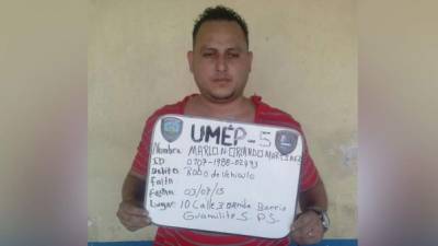 Marlon Orlando Mejía (27), en una posta policial en San Pedro Sula.