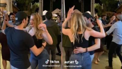 En el clip se ve a Amber Heard bailar con un joven al ritmo de “Como la flor”.