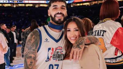 Anuel AA y su novia Laury Saavedra.