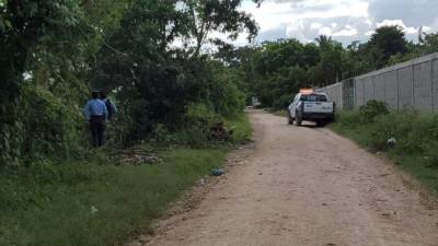 Vista de la escena del crimen en Villanueva, Cortés.