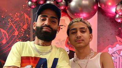 Foto de Arcángel con su hijo Austin.