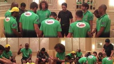 The Christ the Redeemer statue is seen illuminated with the Lebanon flag to pay tribute to victims of a massive explosion that shook the city of Beirut, Lebanese capital, in Rio de Janeiro, Brazil on August 06, 2020. (Photo by CARLOS FABAL / AFP)