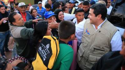 El presidente Juan Orlando Hernández en la colonia Canaán del Distrito Central.