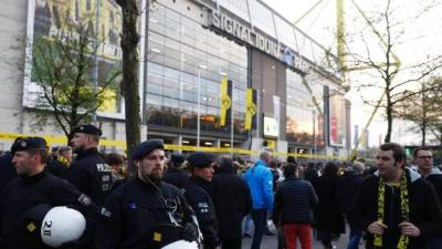 Dortmund's fans display their scarves prior to the UEFA Champions League Group F football match Borussia Dortmund v FC Barcelona in Dortmund, western Germany, on September 17, 2019. (Photo by John MACDOUGALL / AFP)