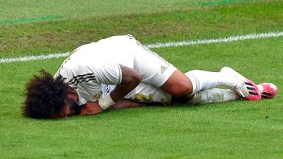 Marcelo se lesionó de su pierna izquierda y no jugará más en lo que resta de la Liga Española. Foto AFP