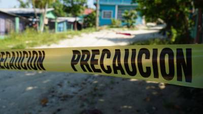 Foto de la escena donde mataron a una mujer en sector Lopez Arellano Choloma , Cortés.