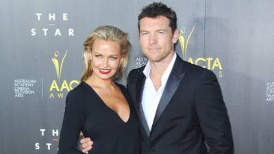 Sam Worthington y su novia Lara Bingle.