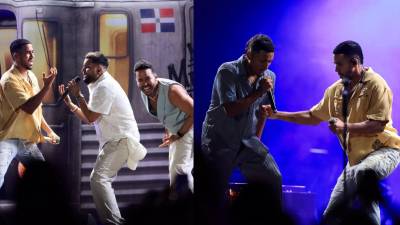 La noche del pasado domingo la lluvia azotó la ciudad de los zorzales, pero ni siquiera eso pudo impedir que el público esperara pacientemente para el show de Romeo Santos y Prince Royce, en el estadio Olímpico Metropolitano de esta ciudad.<b>En la imagen: </b>Romeo Santos y Prince Royce con dos catrachos que subieron para cantar y bailar con ellos.