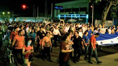 Los empleados de las empresas de Grupo Continental marcharon por la Primera calle de San Pedro Sula.