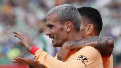 Griezmann celebrando uno de sus dos goles ante Betis.