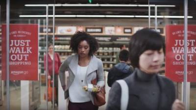 NEW YORK, NEW YORK - MAY 07: People shop at the newly opened Amazon Go Store on May 07, 2019 in New York City. The cashier-less store, the first of this type of store, called Amazon Go, accepts cash and is the 12th such store in the United States located at Brookfield Place in downtown New York. The roughly 1,300-square-foot store sells a variety of food items, prepared meals and Amazon's own meal kits. It is believed that by 2021 Amazon is considering opening up as many as 3,000 of its cashier-free stores across the United States. Spencer Platt/Getty Images/AFP
