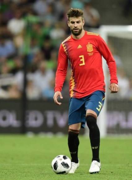 Acompañando a Sergio Ramos, estará Gerard Piqué. Son los fijos en la defensa de España. Foto AFP