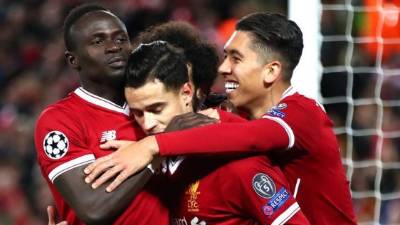 Liverpool's Brazilian goalkeeper Alisson Becker (2L) reacts after conceeding to West Ham United's Spanish striker Antonio Martinez (unseen) during the English Premier League football match between West Ham United and Liverpool at The London Stadium, in east London on February 4, 2019. (Photo by Glyn KIRK / AFP) / RESTRICTED TO EDITORIAL USE. No use with unauthorized audio, video, data, fixture lists, club/league logos or 'live' services. Online in-match use limited to 120 images. An additional 40 images may be used in extra time. No video emulation. Social media in-match use limited to 120 images. An additional 40 images may be used in extra time. No use in betting publications, games or single club/league/player publications. /