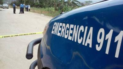 Vehículo de la Policía Nacional en una escena del crimen | Fotografía de archivo.