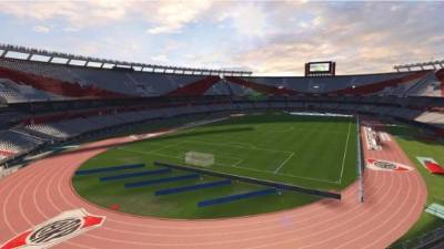 Supporters of River Plate wait at the Monumental stadium in Buenos Aires for the decision of authorities before it was decided that the all-Argentine Copa Libertadores second leg final match between River Plate and Boca Juniors was postponed until Sunday following an attack on the Boca team bus that left players affected by smoke inhalation and broken glass, on November 24, 2018. (Photo by JAVIER GONZALEZ TOLEDO / AFP)