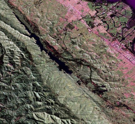 An Uninhabited Aerial Vehicle Synthetic Aperture Radar image of the San Andreas fault in the San Francisco Bay area just west of San Mateo and Foster City is shown in this image released by NASA June 17, 2009. The fault runs diagonally from upper left to lower right. The body of water along the fault line is Crystal Springs Reservoir. JPL scientists have added a new airborne radar tool to their arsenal, UAVSAR, this L-band wavelength radar flies aboard a modified NASA Gulfstream III aircraft from NASA's Dryden Flight Research Center, Edwards, Calif. The compact, reconfigurable radar, housed in a pod under the aircraft's fuselage, uses pulses of microwave energy to detect and measure very subtle deformations in Earth's surface, such as those caused by earthquakes, volcanoes, landslides and glacier movements. REUTERS/NASA/JPL/Handout (UNITED STATES SCI TECH) FOR EDITORIAL USE ONLY. NOT FOR SALE FOR MARKETING OR ADVERTISING CAMPAIGNS