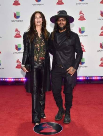 LAS VEGAS, NV - NOVEMBER 15: (L-R) Angela Alvarado and Draco Rosa attend the 19th annual Latin GRAMMY Awards at MGM Grand Garden Arena on November 15, 2018 in Las Vegas, Nevada. David Becker/Getty Images for LARAS/AFP