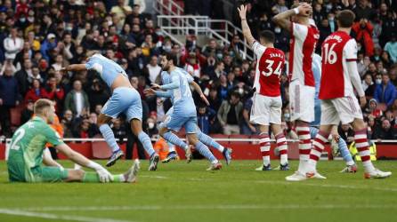 Jugadores del Manchester City celebrando el gol del triunfo marcado por Rodri.