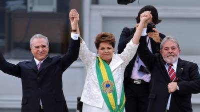 Michel Temer con Dilma Rousseff e Luiz Inacio Lula da Silva captados el 1 de enero de 2011, cuando aún eran aliados. Foto: AFP/Evaristo Sa