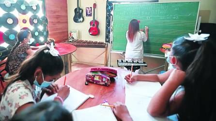 Recaudan fondos para construir escuela de música para los niños de Chamelecón
