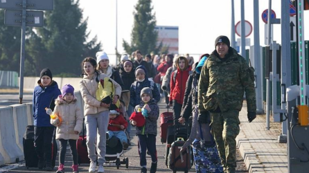 Ucranianos huyendo de su país.