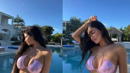 <b>Kylie Jenner</b> mostró sus abdominales tonificados y su amplio escote en un bikini rosa metálico en sus recientes vacaciones en las <b>Islas Turcas y Caicos.</b>