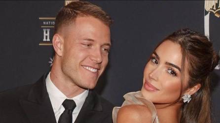 Christian McCaffrey y Olivia Culpo.