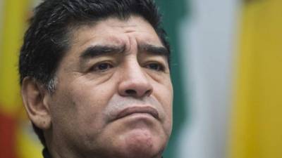 Argentinian former football player Diego Armando Maradona reacts during the Russia 2018 World Cup round of 16 football match between France and Argentina at the Kazan Arena in Kazan on June 30, 2018. / AFP PHOTO / Roman Kruchinin / RESTRICTED TO EDITORIAL USE - NO MOBILE PUSH ALERTS/DOWNLOADS