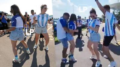 Una aficionada hondureña y una argentina bailaron punta en las afueras del Hard Rock Stadium antes del amistoso.