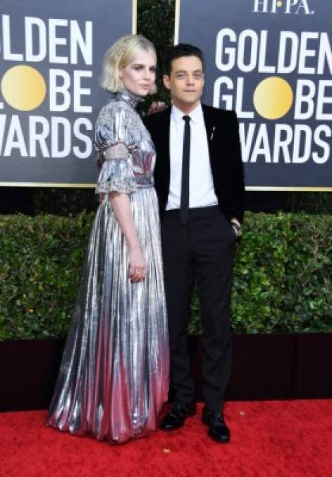 Los actores Rami Malek y Lucy Boynton han mantenido su romance desde que fueron flechados por cupido mientras rodaban 'Bohemian Rhapsody'. <a href='https://www.laprensa.hn/fotogalerias/farandula/1346563-411/globos-de-oro-2020-mejor-peor-vestidos-alfombra-roja' style='color:red;text-decoration:underline' target='_blank'>Globos de Oro 2020: Los mejor y peor vestidos en la alfombra roja</a>