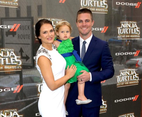 NEW YORK, NY - MAY 22: (L-R) Cassandra Jean Amell, Mavi Alexandra Jean Amell and Stephen Amell attend the 'Teenage Mutant Ninja Turtles: Out Of The Shadows' world premiere at Madison Square Garden on May 22, 2016 in New York City. (Photo by Paul Zimmerman/FilmMagic)