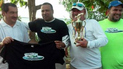 El alcalde Allan Ramos, entre los premiados.