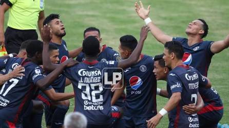 Jugadores del Motagua celebrando el gol de Roberto Moreira.