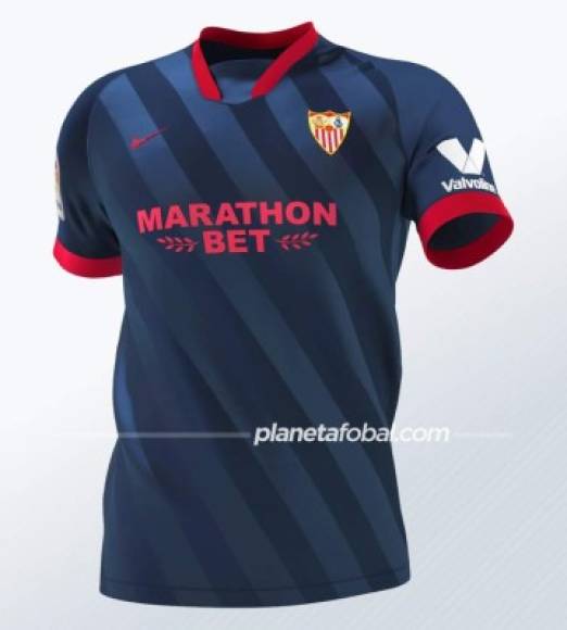 La tercera equipación del Sevilla para la temporada 2020-2021 es azul con los ribetes del cuello y las mangas en naranja,