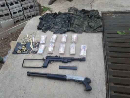 Decomisan armas, droga, joyas y dinero en Tegucigalpa
