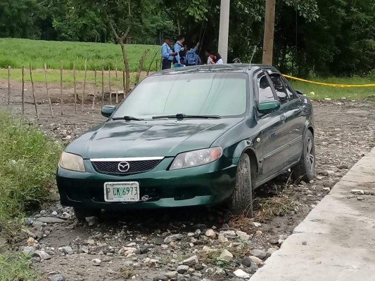 Hallan cadáver de joven atado de manos en el baúl de un auto en Choloma