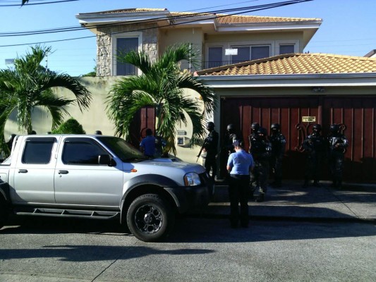 Aseguran bienes a dos colombianos en San Pedro Sula