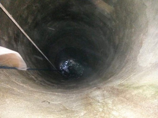 Niño muere al caer a pozo de 15 metros de profundidad