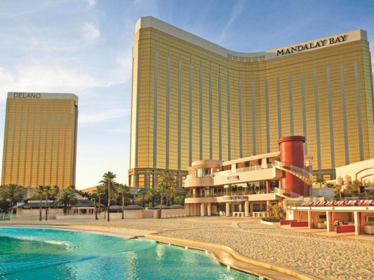 FILE - OCTOBER 02, 2017: A gunman named as Stephen Paddock opened fire on the Route 91 Harvest Country Music Festival in Las Vegas from a room on the 32nd floor of the Mandalay Bay Resort and Casino. At least 50 people died and hundreds have been injured. LAS VEGAS - OCTOBER 19: An aerial photo shows the Mandalay Bay Resort & Casino October 19, 2005 in Las Vegas, Nevada. Ethan Miller/Getty Images/AFP