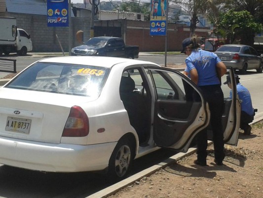 Tiroteo dentro de taxi deja dos heridos en Tegucigalpa