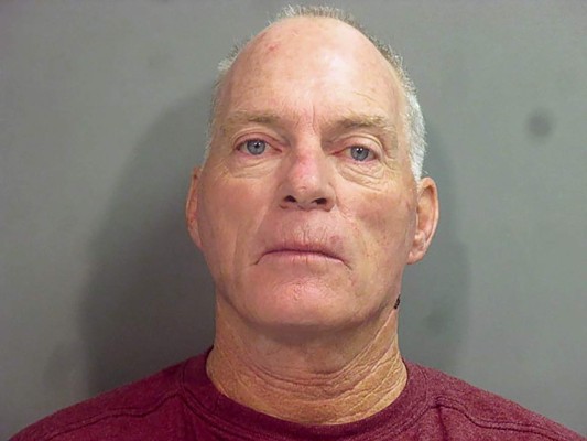 This booking photo released on January 8, 2021 courtesy of Washington County Sheriff?s Office shows Richard Barnett. - The Justice Department said it had arrested several suspects, including Richard Barnett, a supporter of US President Donald Trump who invaded the office of House Speaker Nancy Pelosi, and another man found with 11 styrofoam-enhanced Molotov cocktails in his truck. (Photo by Handout / Washington County Sheriff?s Office / AFP) / RESTRICTED TO EDITORIAL USE - MANDATORY CREDIT 'AFP PHOTO / Washington County Sheriff?s Office ' - NO MARKETING - NO ADVERTISING CAMPAIGNS - DISTRIBUTED AS A SERVICE TO CLIENTS