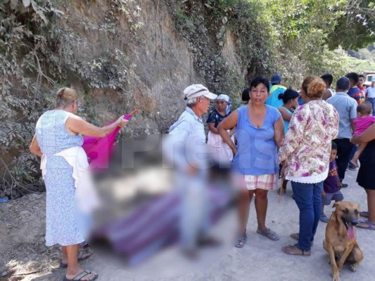 Muere una mujer y un niño desaparece al caer vehículo en el río Ulúa