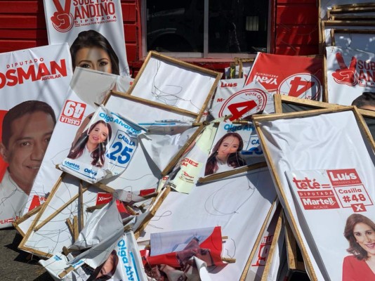 ENEE retira propaganda política en postes de tendido eléctrico