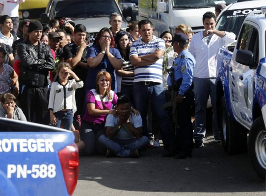 Matan a transportista de escolares y una niña resulta herida en Tegucigalpa