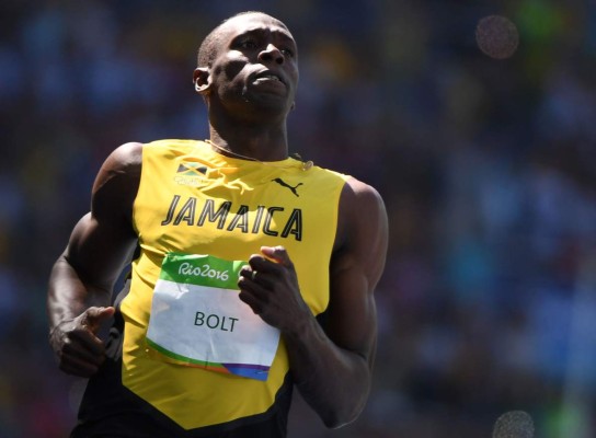 Usain Bolt no tuvo problemas en su debut en los Juegos Olímpicos
