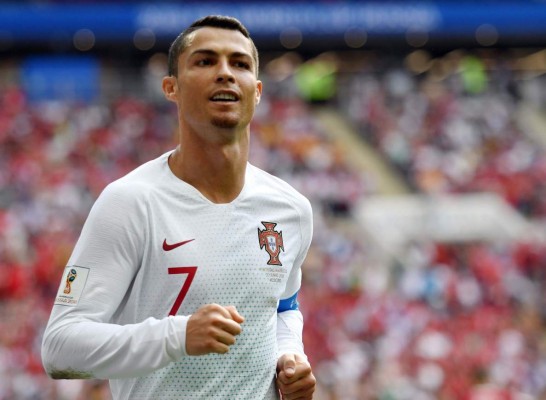 Portugal's forward Cristiano Ronaldo runs during the Russia 2018 World Cup Group B football match between Portugal and Morocco at the Luzhniki Stadium in Moscow on June 20, 2018. / AFP PHOTO / YURI CORTEZ / RESTRICTED TO EDITORIAL USE - NO MOBILE PUSH ALERTS/DOWNLOADS
