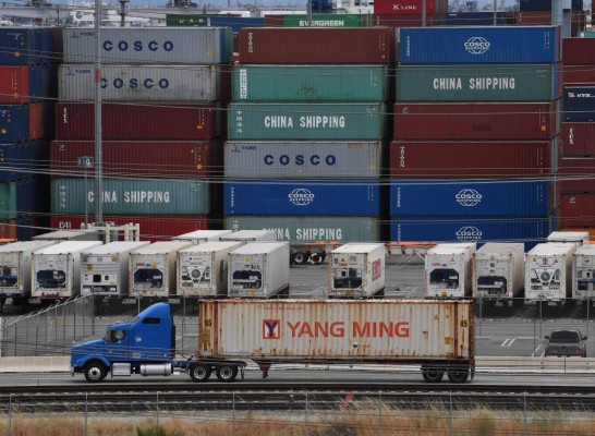 (FILES) In this file photo taken on May 10, 2019 Unloaded containers from Asia are seen at the main port terminal in Long Beach, California on May 10, 2019. - Amid rising fears over US-Chinese trade tensions and mounting tariffs, President Donald Trump said on May 11, 2019, that firms could easily avoid additional costs by producing goods in the US. 'Such an easy way to avoid Tariffs? Make or produce your goods and products in the good old USA. Its very simple!' he said Saturday on Twitter, echoing a similar message he sent Friday -- and even retweeted. (Photo by Mark RALSTON / AFP)