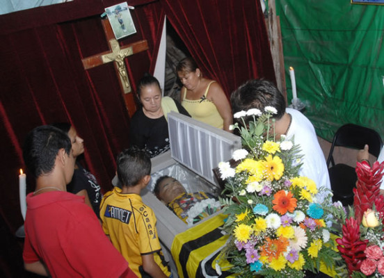 Honduras: Un día después de masacre en zapatería